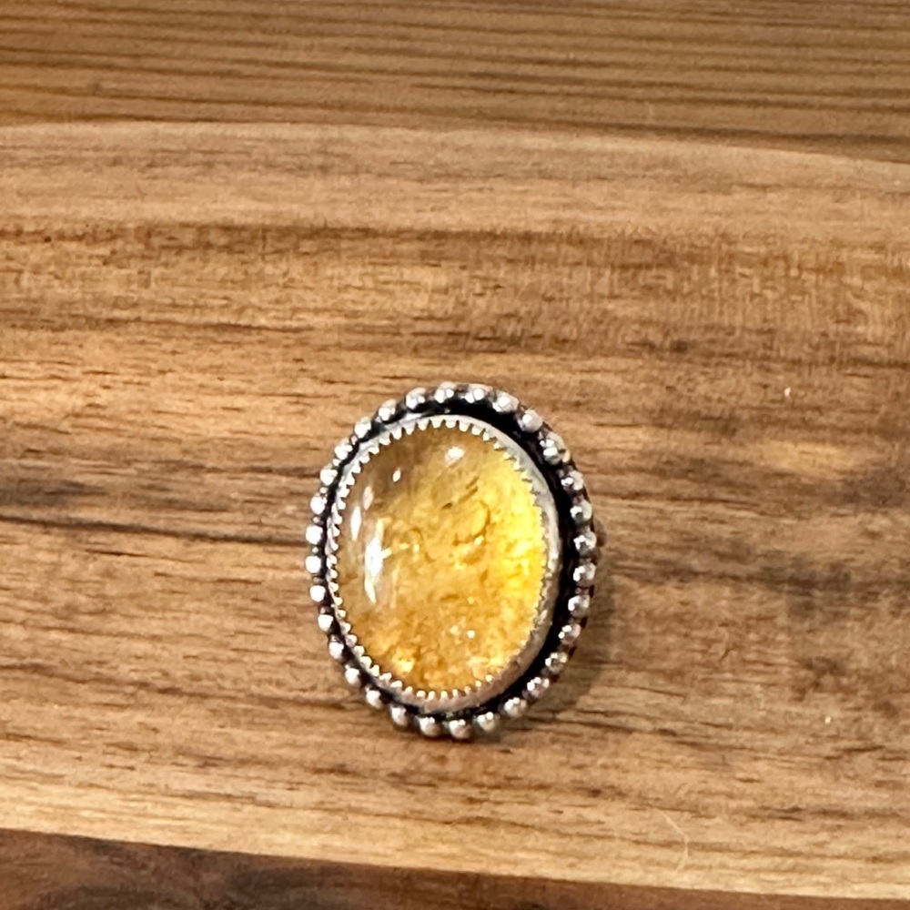 Oval Citrine set in silver sz 7